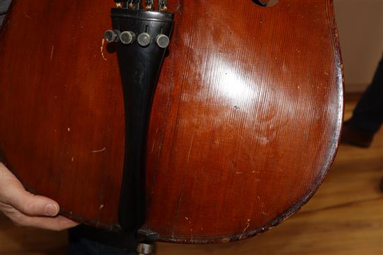 A cased cello with bow